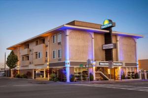 a hotel building with a street sign in front of it at Days Inn by Wyndham Eureka CA in Eureka