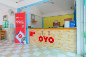 a restaurant with a counter in a room at Koh Lak Resort in Prachuap Khiri Khan