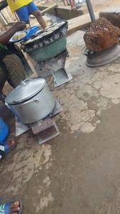 a toilet sitting on the ground in the dirt at muhammad baba fbm001 in London