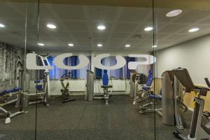 a gym with the google logo on the wall at Hotel Arctic in Ilulissat