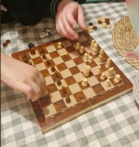 a person playing a game of chess on a chessboard at Willow View Streamside Retreat near Kynren Durham in Newton Aycliffe +30 photos