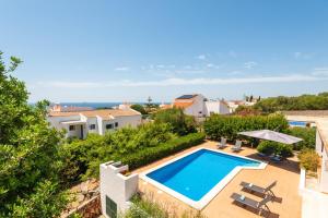 an image of a villa with a swimming pool at Villa Casa Nova by 3VILLAS in Sant Lluis