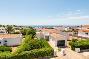 a villa with a view of the ocean at Villa Casa Nova by 3VILLAS in Sant Lluis