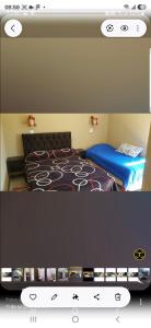 a bedroom with two beds with blue sheets at S de uribe 2 in Uribelarrea