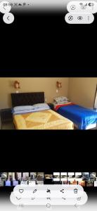 two beds sitting next to each other in a room at S de uribe 2 in Uribelarrea