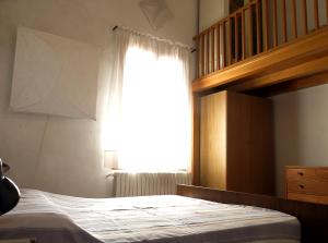 เตียงในห้องที่ Ca' Regina