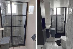 a bathroom with a glass shower and a toilet at Tiny House Petite - Callantsoog aan Zee in Callantsoog