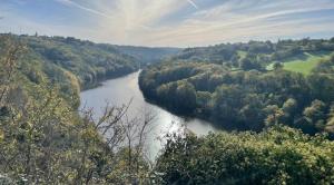 an aerial view of a river with trees at Studio paisible, 30m2 in La Souterraine