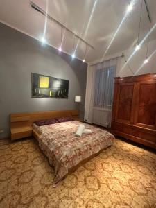a bedroom with a large bed in a room at Bnb fantasia in Bologna