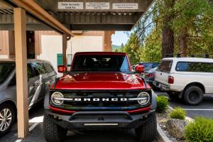 a red truck parked in a parking lot at Suite Serenity Condo by NW Comfy Cabins in Leavenworth