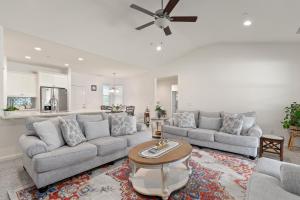 a living room with two couches and a table at Gonzolez Apartments in Zamboanga