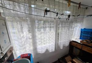 a window with birds sitting on a wire at Exclusive location in West Bay +12 photos