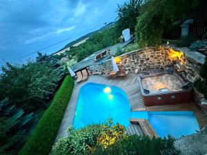 an overhead view of a swimming pool and a hot tub at Rotunda U Václava in Šebkovice