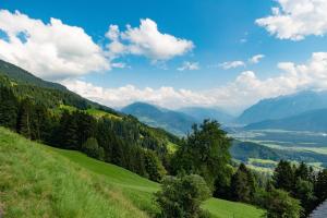 a view of a valley with a river and mountains at Bischahof ein GefühlsErlebnis in Düns