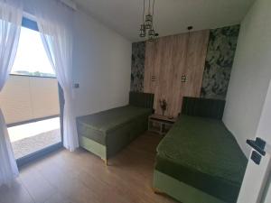 Llit o llits en una habitació de Łyso Chatka