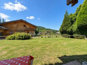 a large yard in front of a barn at Studio charmant pour 4 pers avec parking à Notre-Dame-de-Bellecombe - FR-1-505-49 in Notre-Dame-de-Bellecombe +15 photos