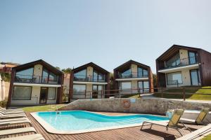 an image of a house with a swimming pool at KV Residences 