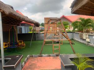 a playground on the roof of a house at ffa resort centre in Akure