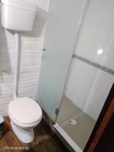 a bathroom with a toilet and a shower at Dali in La Pedrera