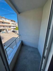 a balcony with a view of a parking lot at Raif Arda Apart in Marmara