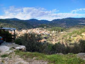 a view of a city from a hill at ΑΝΝΑ'S Πύργος - ΣΑΜΟΣ in Pýrgos