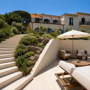a patio with a garden and a house at Maison Provence in Saint-Tropez