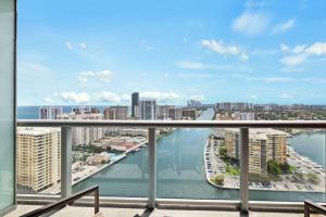 a view of a city from a balcony at Upper Studio Stunning Intracoastal Views in Hallandale Beach