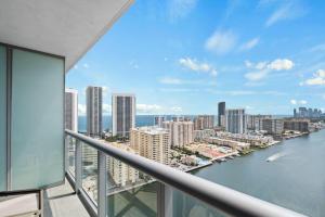 a view of the city from the balcony of a building at Upper Studio Stunning Intracoastal Views in Hallandale Beach +52 photos