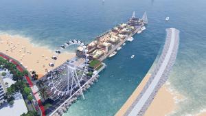 an aerial view of a ferris wheel in the water at Flats New York Meia Praia Itapema in Itapema