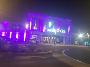a building with purple lights on the front of it at Espace naturel in La Tour-de-Salvagny
