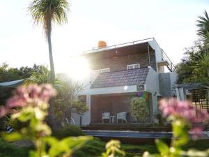 a house with a lot of solar panels on it at Paradise Pool by StayJadePoolGarden30min E-city in Hosūr
