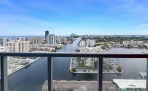 a view of a river in a city with buildings at 30th Fl Beachwalk Studio Bay Balcony in Hallandale Beach