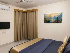 TV a/nebo společenská místnost v ubytování DeVerveil Service Apartment