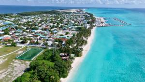 an aerial view of the island of utila at Naeco Select Pearl in Hanimaadhoo