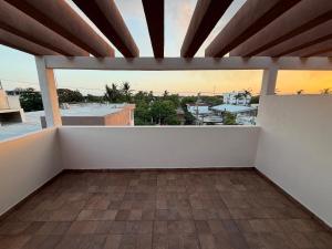 an empty balcony with a view of a city at Casa Cielo del Mar in Ciudad Madero