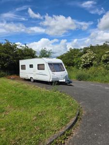 a white caravan parked on the side of a road at Sterling Leisure in Ferryhill