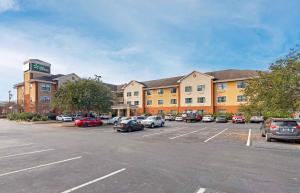 a parking lot in front of a hotel at Extended Stay America Suites - Savannah - Midtown in Savannah