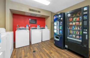 a group of refrigerators and machines in a store at Extended Stay America Select Suites - Jacksonville - Baymeadows in Sunbeam