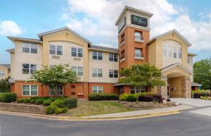 a building with a clock on top of it at Extended Stay America Suites - Columbia - Northwest Harbison in Harbison