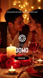 a group of people sitting at a table with a candle at Espiritu Domo Lodge in Coinco