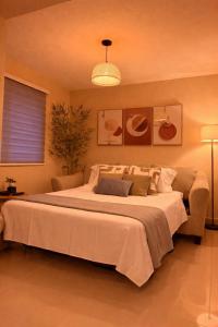 a bedroom with a large bed in a room at Villa Yasmín - Apartamento Top in Villa Canales +41 photos