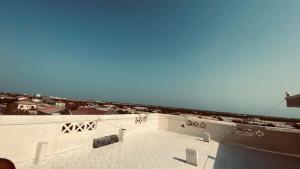 a skateboard ramp with graffiti on the side of a building at Berbera aparthotel in Berbera