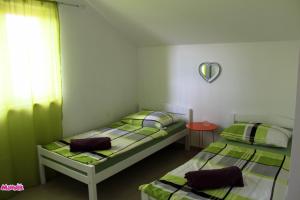 Posteľ alebo postele v izbe v ubytovaní Apartment Joe
