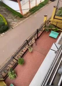 an overhead view of a balcony with plants at Résidence shalismi in Yaoundé