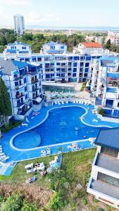 an aerial view of a swimming pool at a resort at Divine place Pomorie in Pomorie