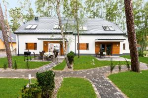Vonkajšia záhrada v ubytovaní Apartamenty Villa Baltic Sun II i III