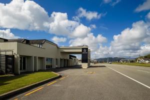 a building on the side of a road at The Ashley Hotel Greymouth in Greymouth