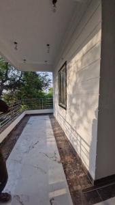 a empty porch of a house with a window at Diksha Heritage In in Prayagraj