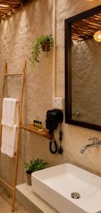 a bathroom with a sink and a mirror at 87 Ahangama in Ahangama