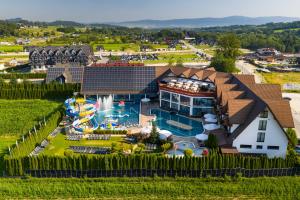 an aerial view of a resort with a swimming pool at Termy Szaflary in Szaflary